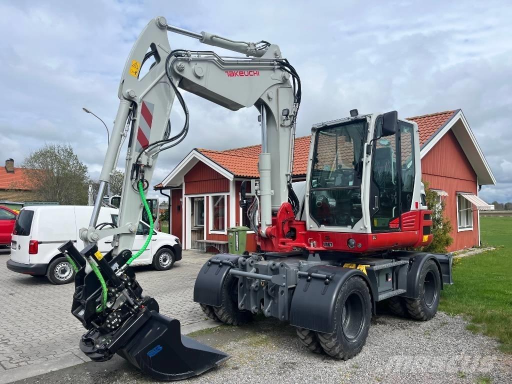 Takeuchi TB 395 W  휠 굴삭기