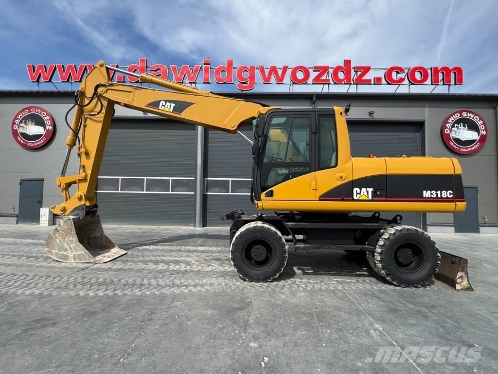 CAT M 318 C  휠 굴삭기