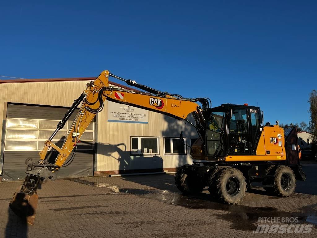 CAT M 315  휠 굴삭기