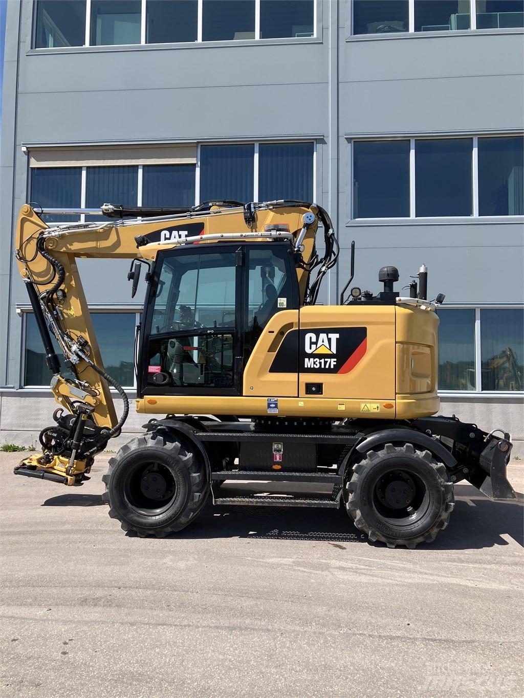 CAT 317 F  휠 굴삭기
