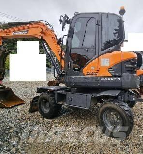Doosan DX65W  휠 굴삭기