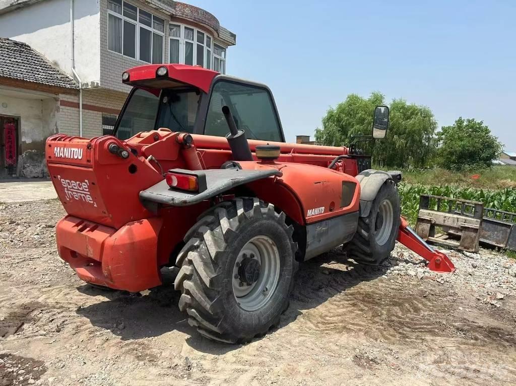 Manitou MT 1740 SL T  스키드로더