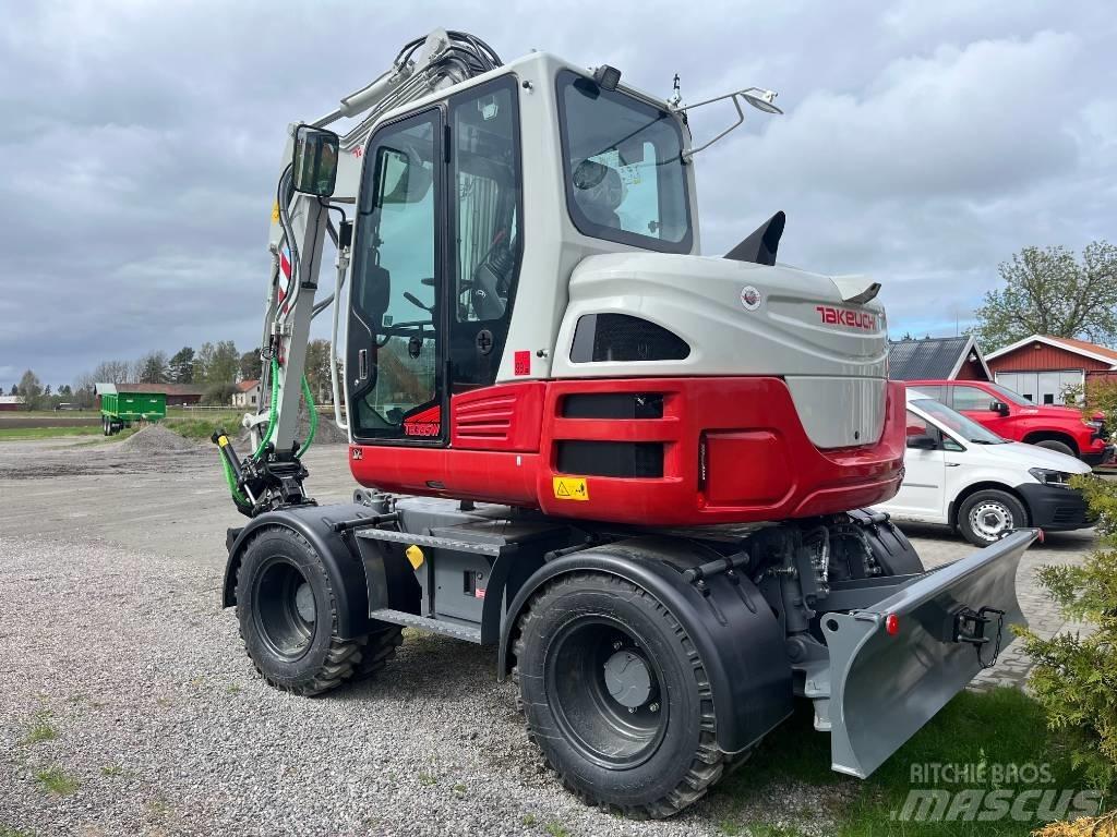 Takeuchi TB 395 W  휠 굴삭기