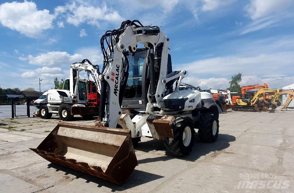 Mecalac 12 M TX  휠 굴삭기