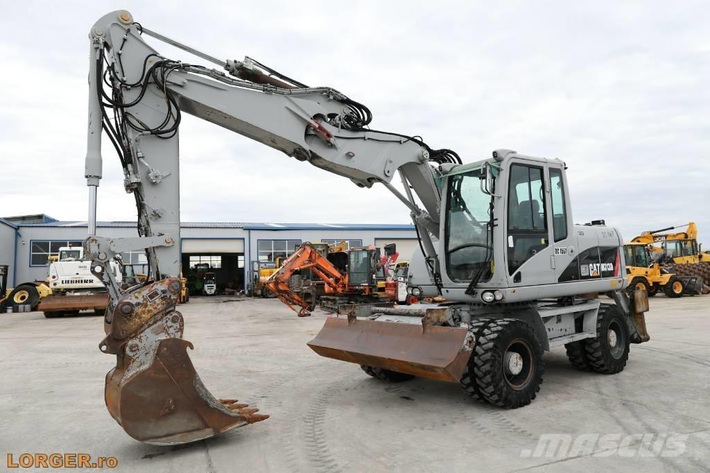 CAT M 313 D  휠 굴삭기