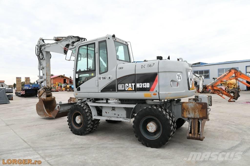 CAT M 313 D  휠 굴삭기