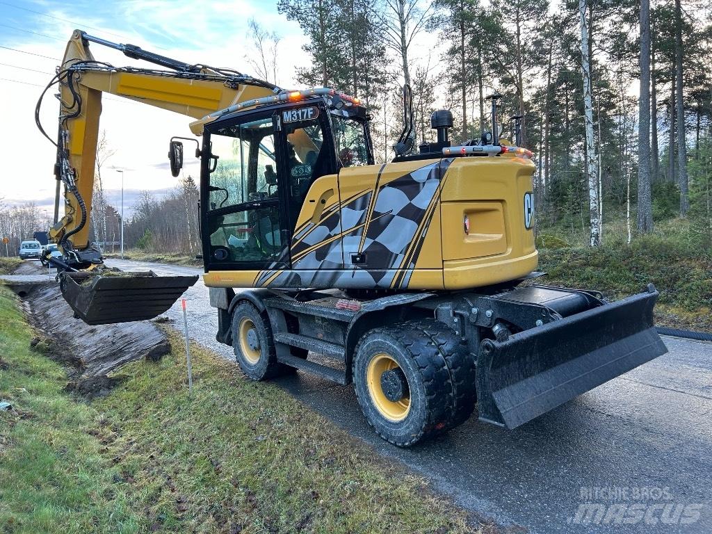 CAT M 317F  휠 굴삭기