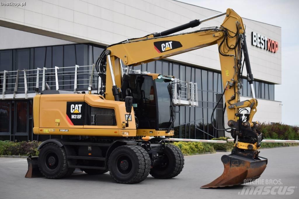 CAT M 318 F  휠 굴삭기