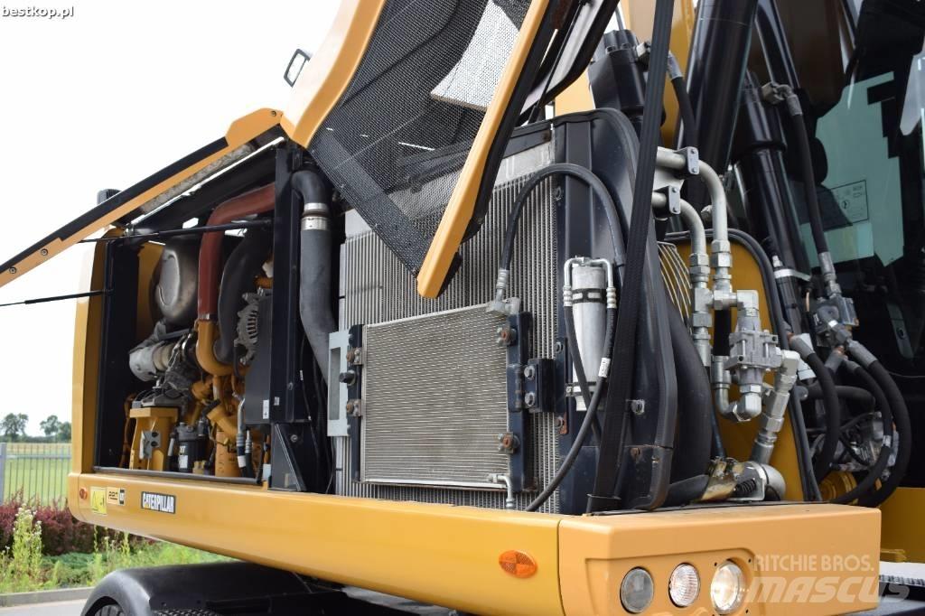 CAT M 318 F  휠 굴삭기