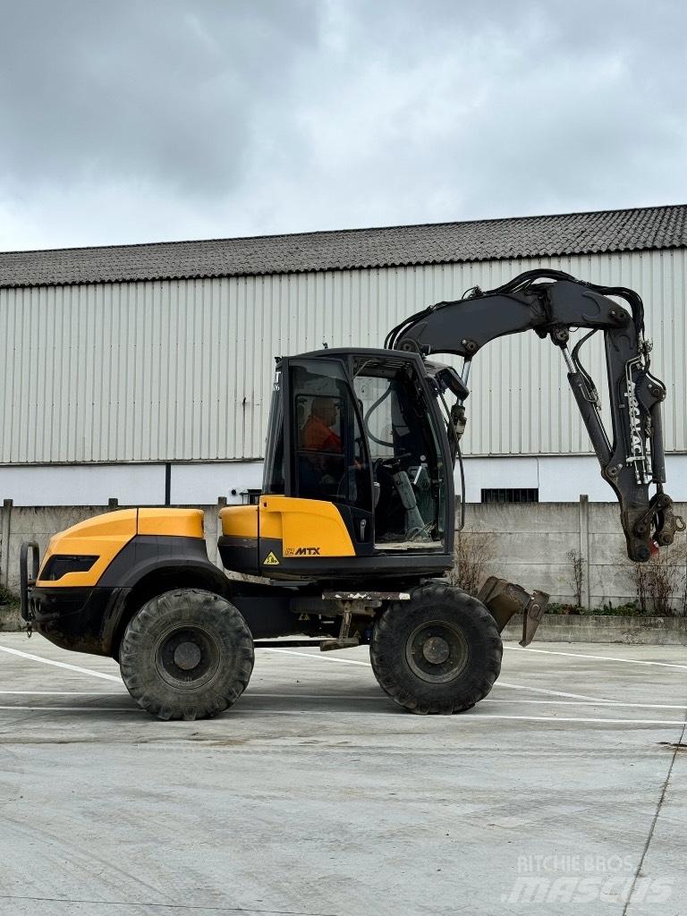 Mecalac 12 MTX  휠 굴삭기