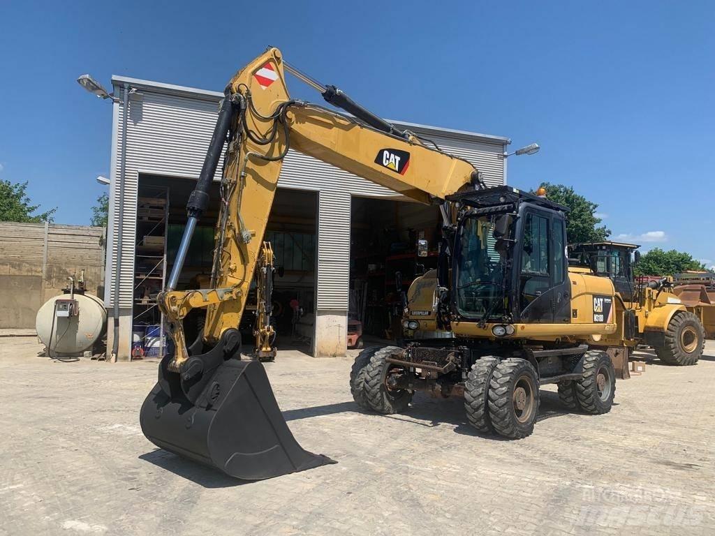 CAT M 318 D  휠 굴삭기