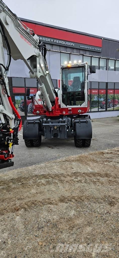 Takeuchi TB 395 W  휠 굴삭기