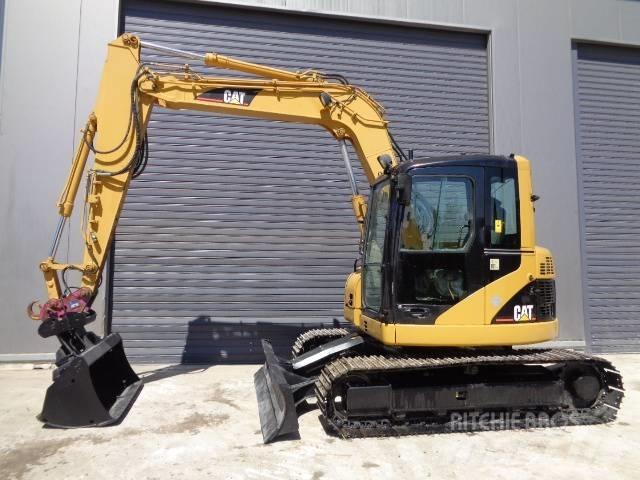CAT 308 C CR 중형굴삭기 7톤-28톤