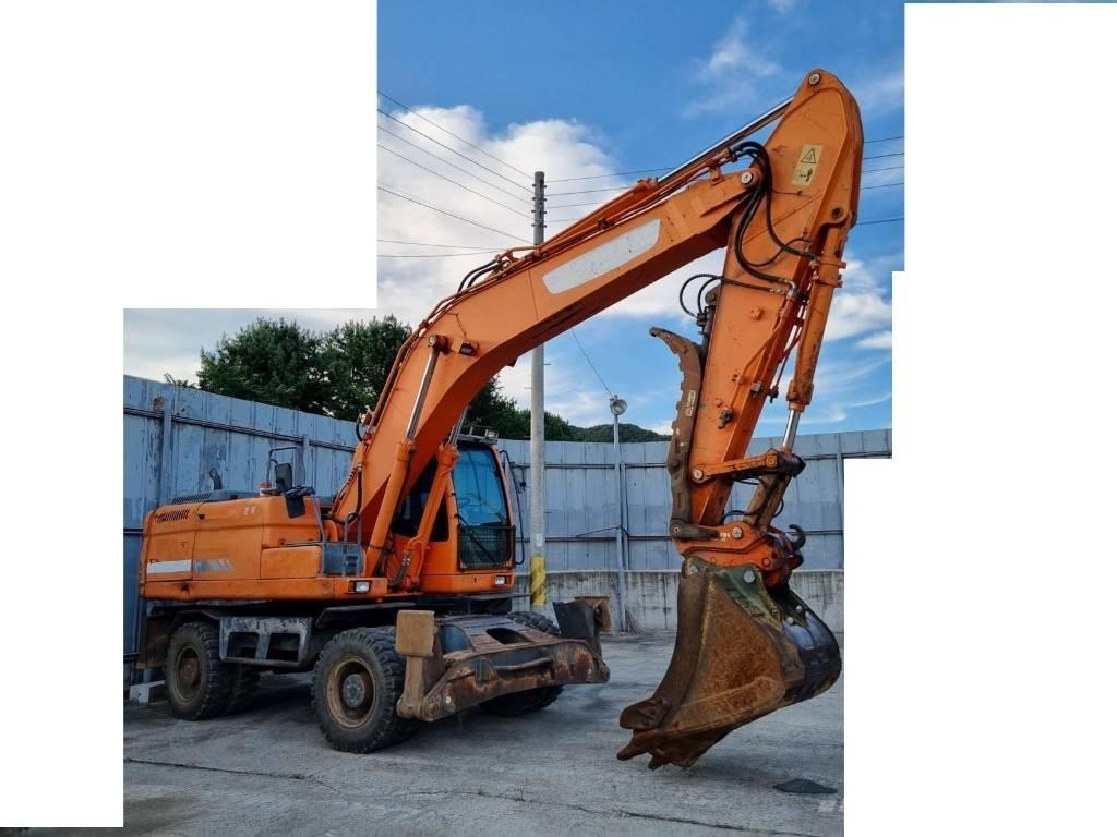 Doosan DX 210 W  휠 굴삭기