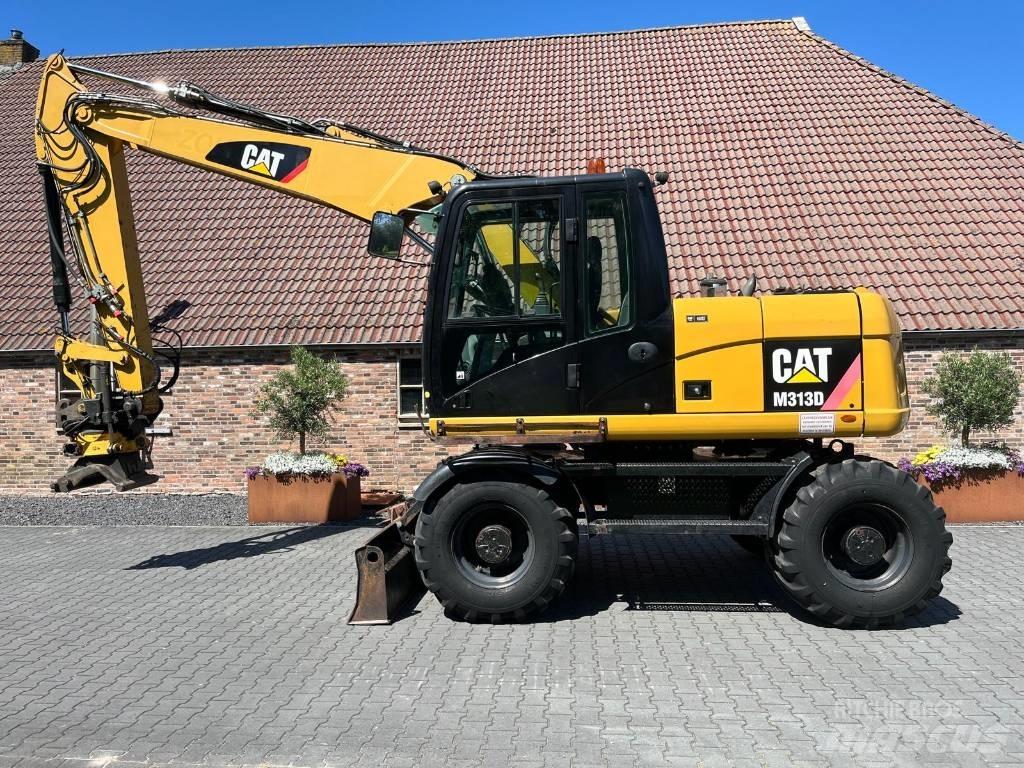 CAT M 313 D  휠 굴삭기
