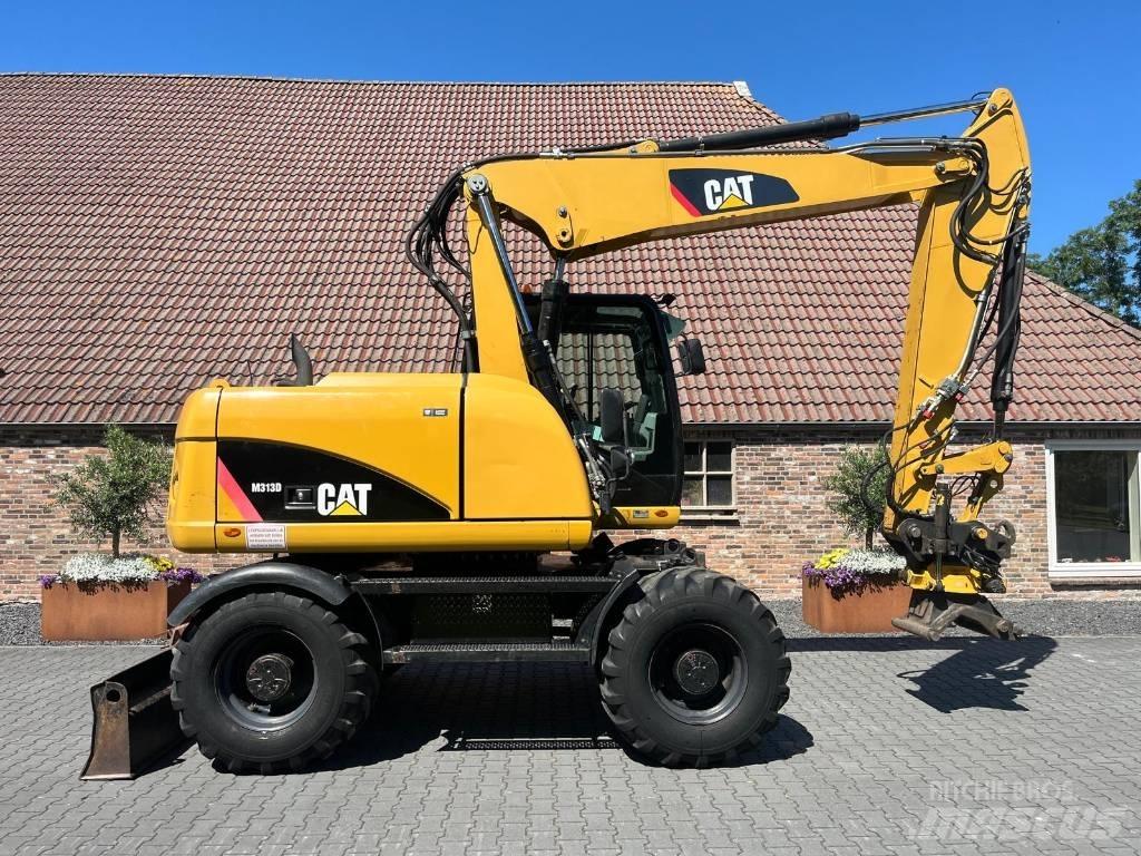 CAT M 313 D  휠 굴삭기