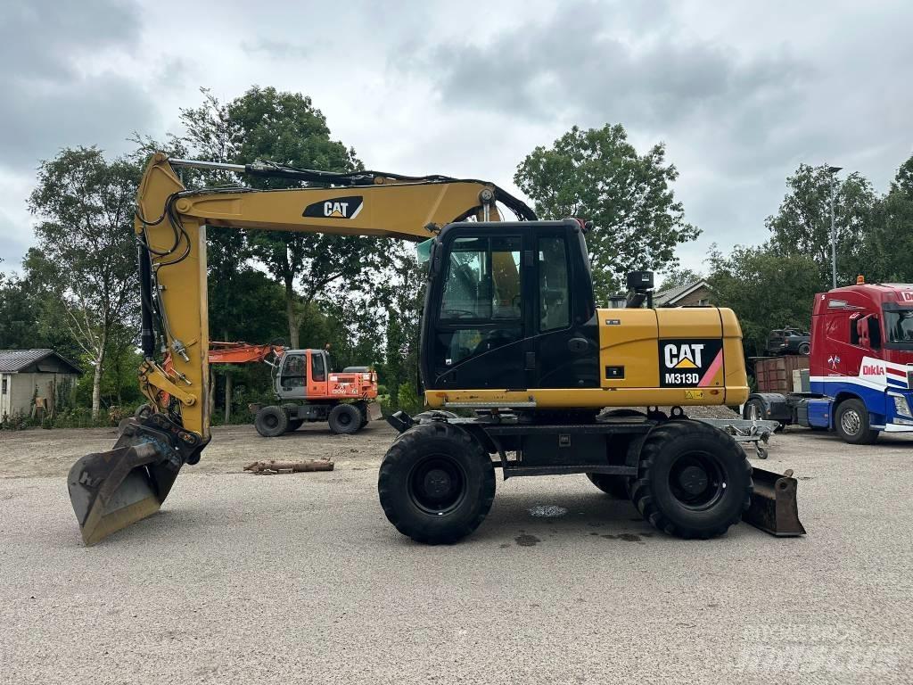 CAT M 313 D  휠 굴삭기