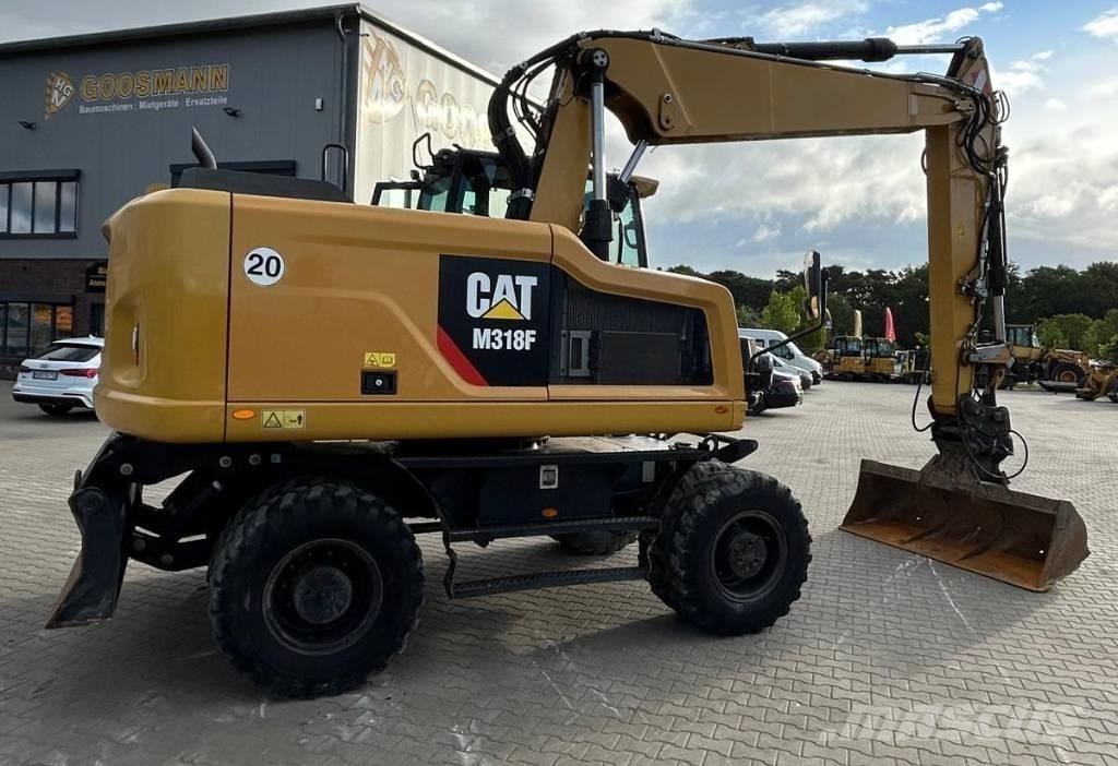 CAT M 318 F  휠 굴삭기