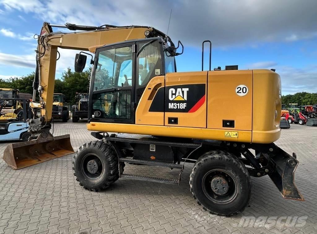 CAT M 318 F  휠 굴삭기
