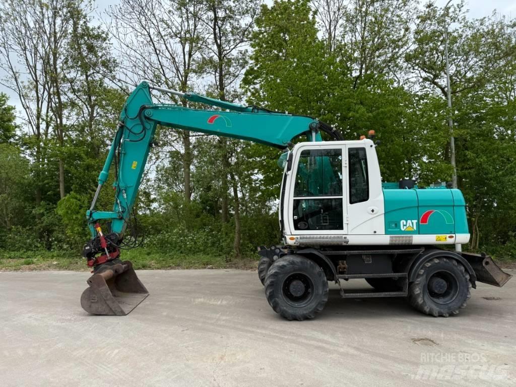 CAT M 313 D  휠 굴삭기