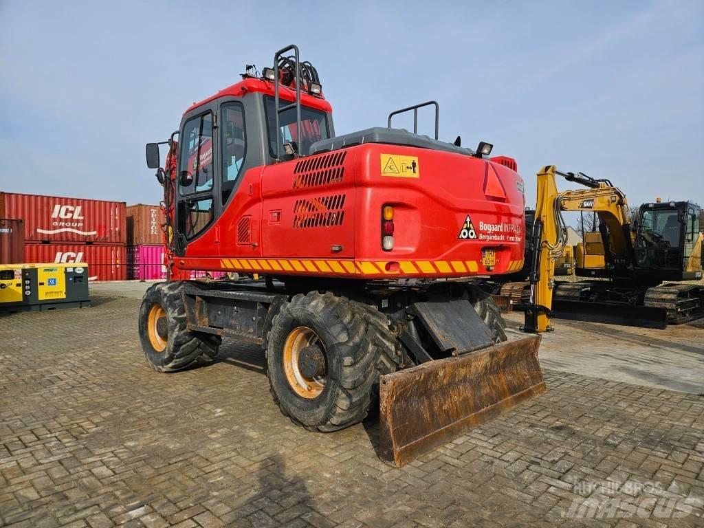 Doosan DX 140 W-3  휠 굴삭기