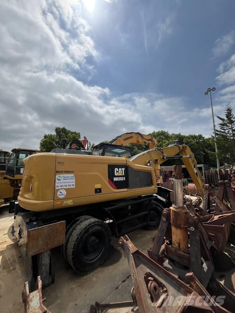 CAT MH 3022  휠 굴삭기