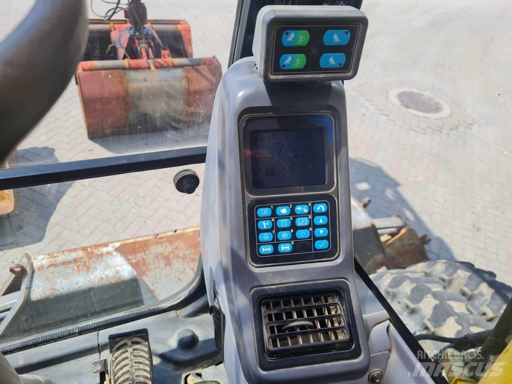 Komatsu PW 140-7  휠 굴삭기