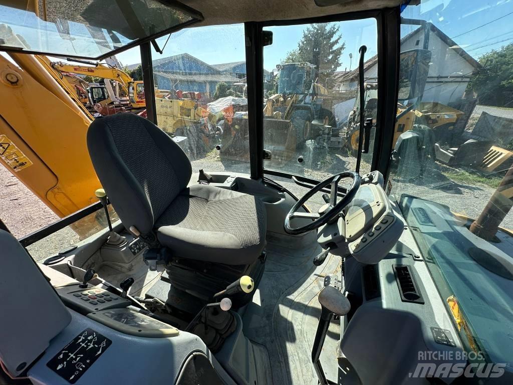 Fermec 860 백호로더