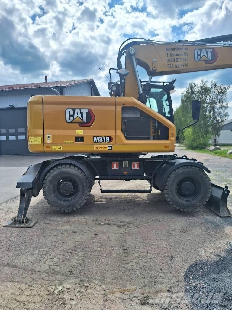 CAT M 318  휠 굴삭기