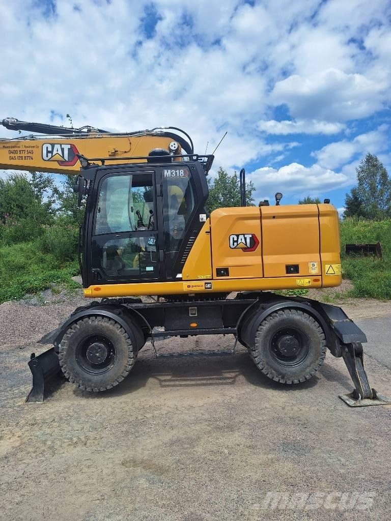CAT M 318  휠 굴삭기