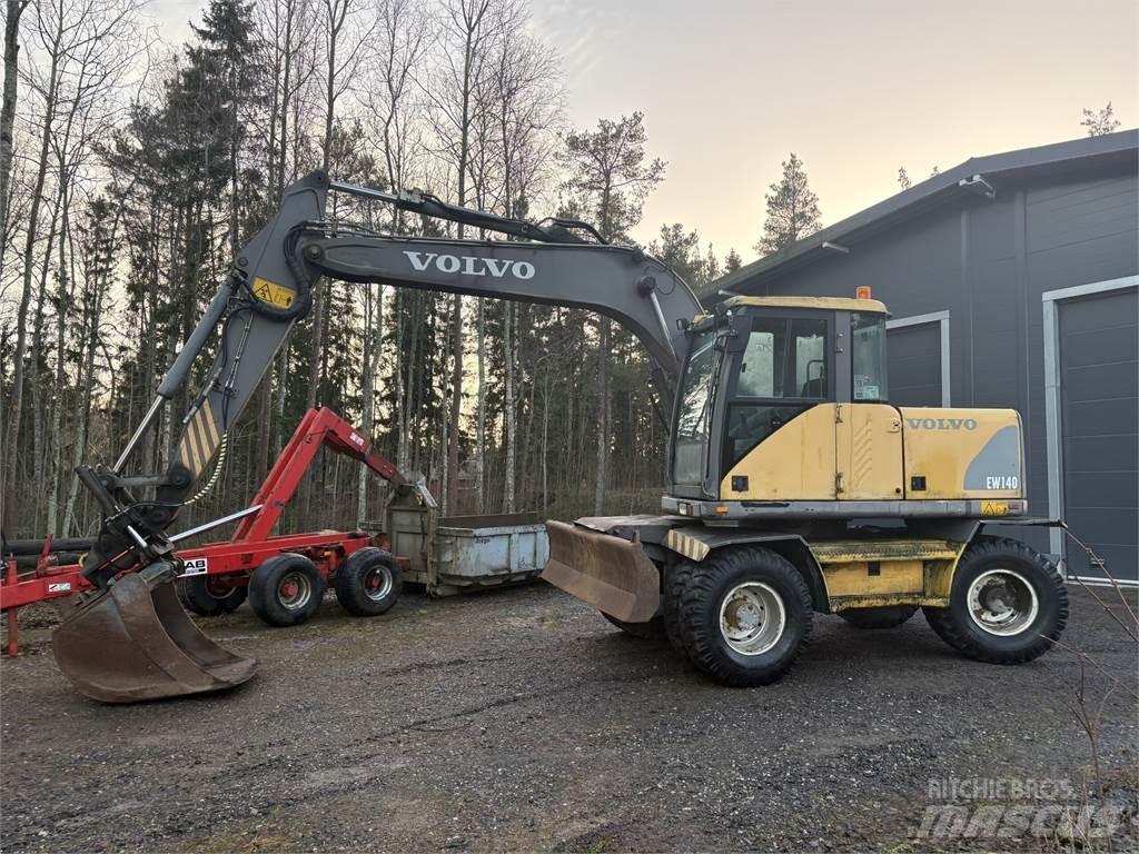 Volvo EW140  휠 굴삭기