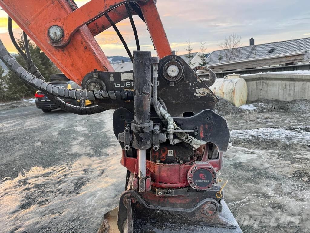 Doosan DX 140 W  휠 굴삭기