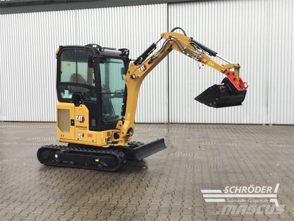 CAT 302 CR  휠 굴삭기