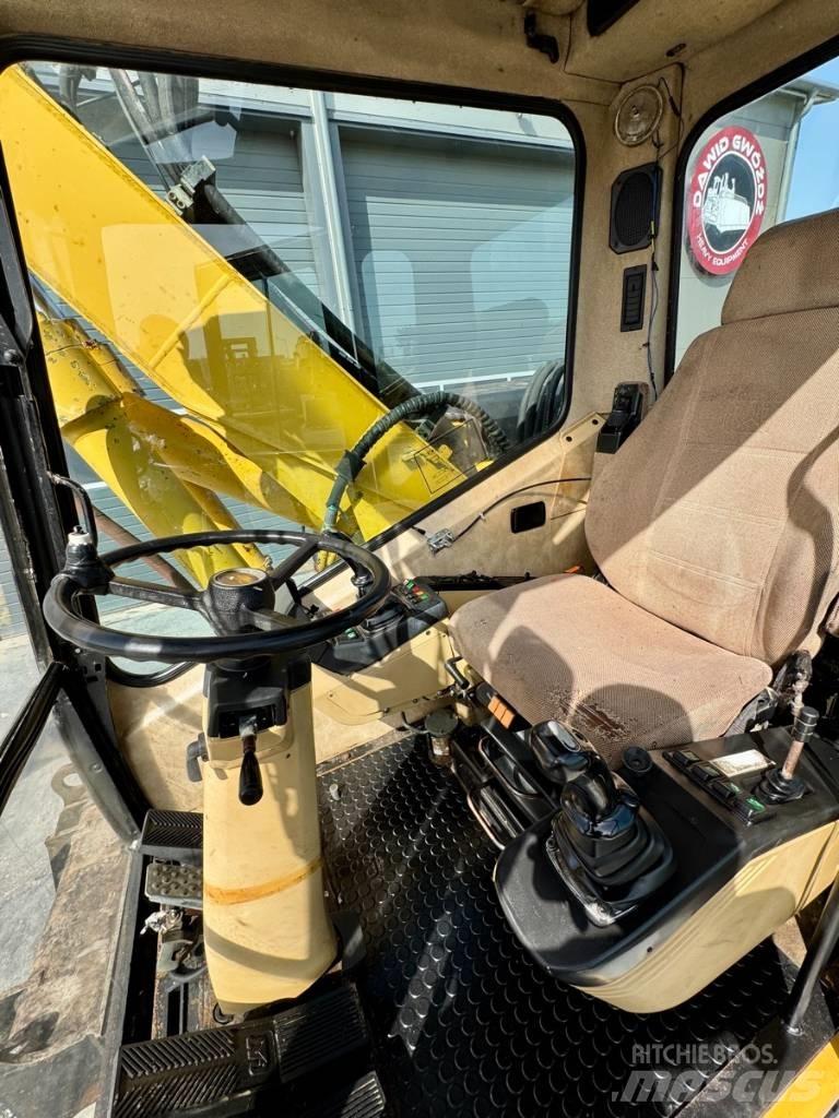 CAT M 312  휠 굴삭기