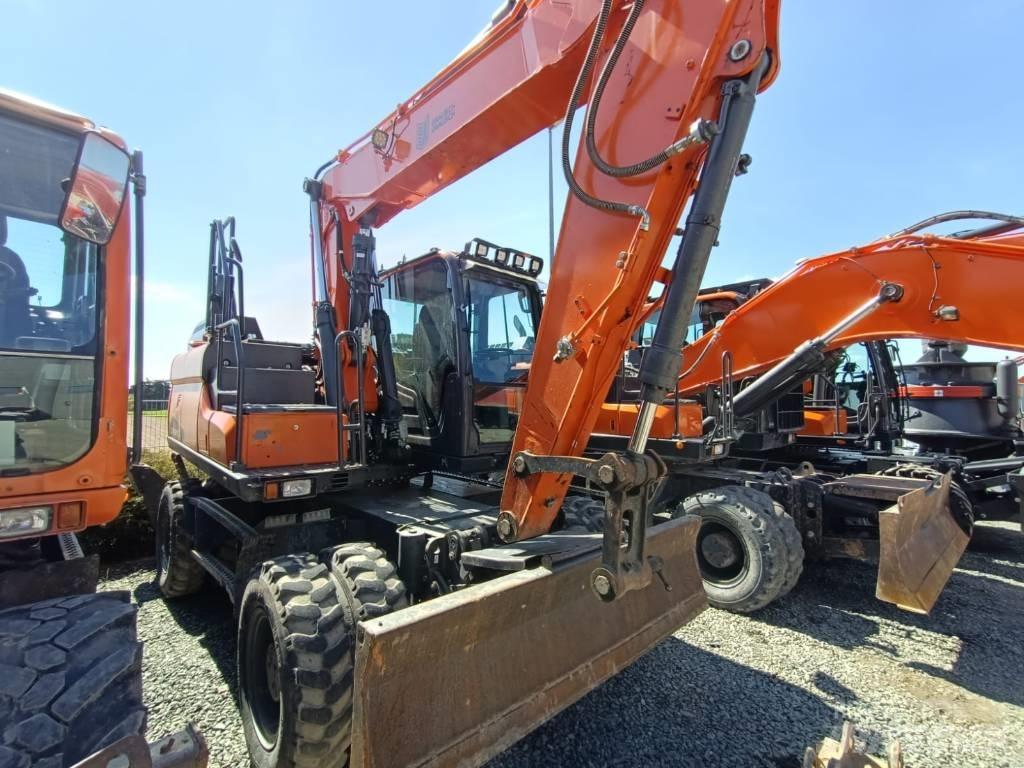 Doosan DX140W-5  휠 굴삭기