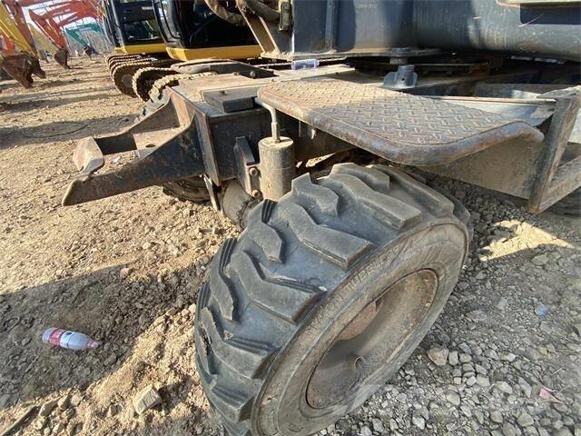Doosan DX60W  휠 굴삭기