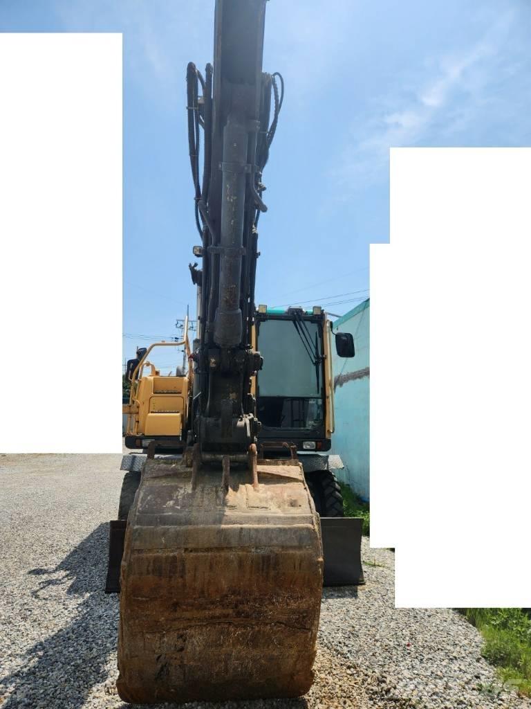 Volvo EW145BP  휠 굴삭기