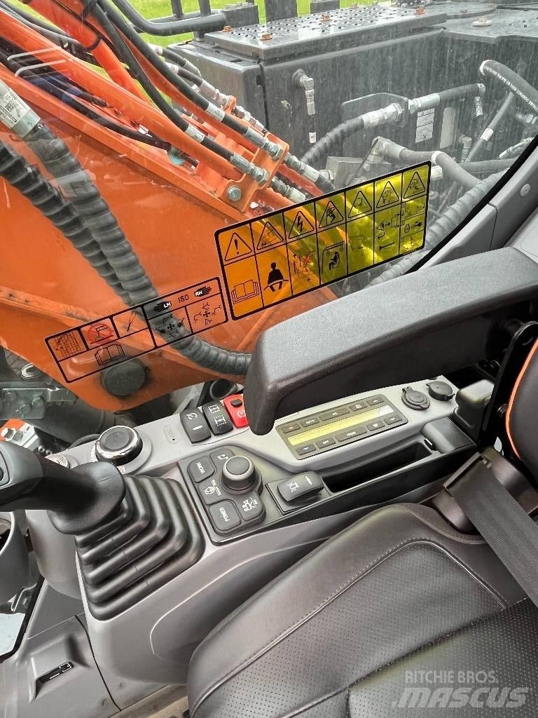 Develon DX140W-7  휠 굴삭기