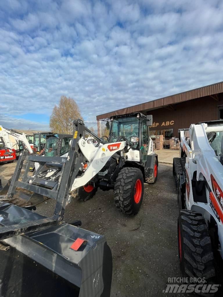 Bobcat L 85 프론트 로더 및 굴착기