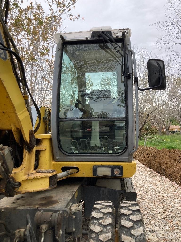 New Holland MH 2.6  휠 굴삭기