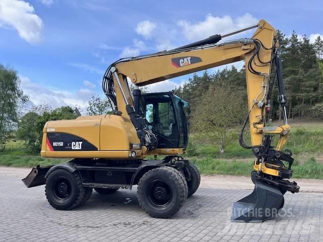 CAT M 315 D  휠 굴삭기