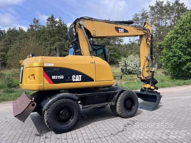 CAT M 315 D  휠 굴삭기