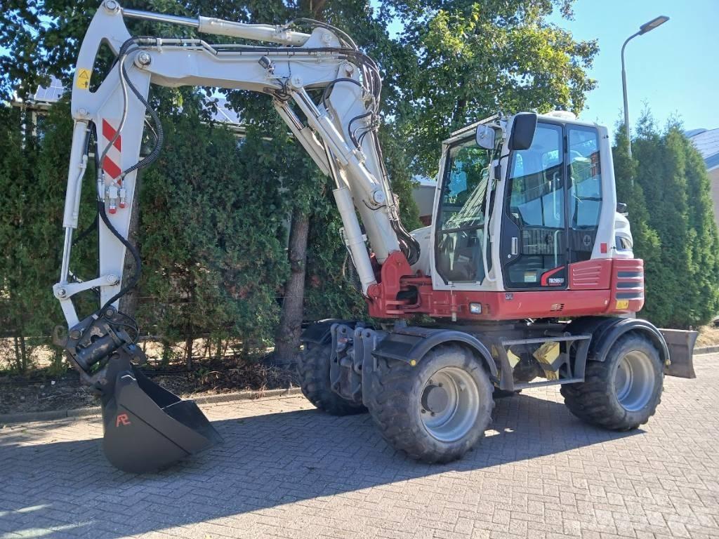 Takeuchi TB 295 W  휠 굴삭기
