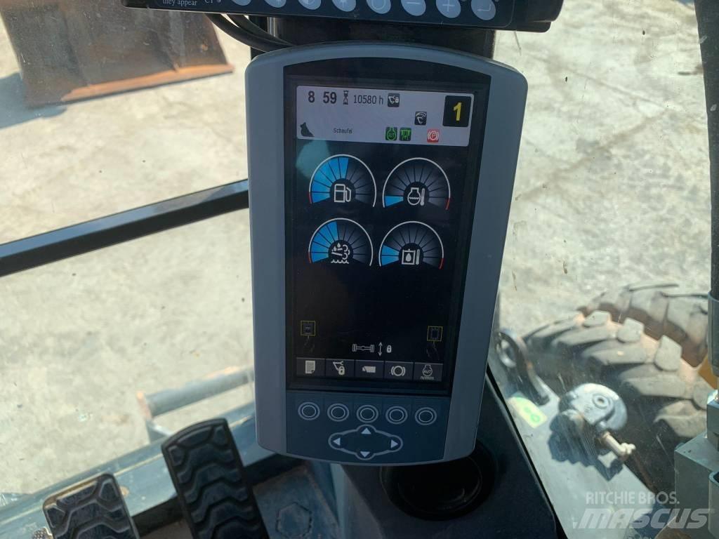 CAT M 318 F  휠 굴삭기