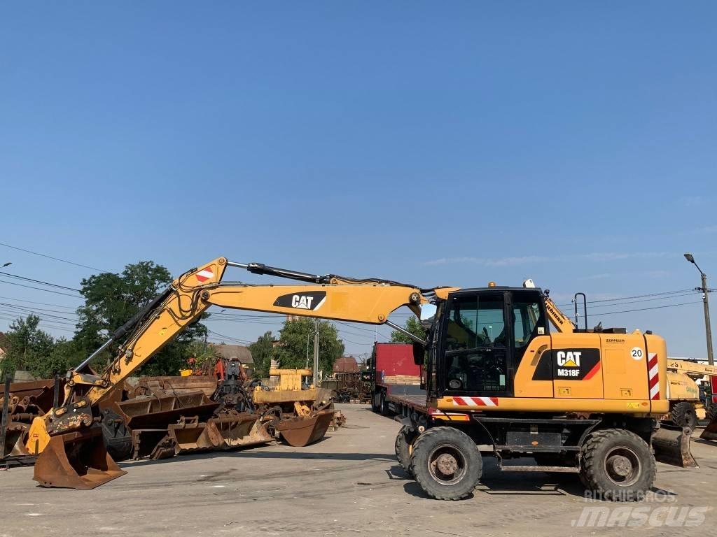 CAT M 318 F  휠 굴삭기