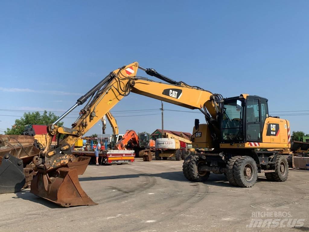 CAT M 318 F  휠 굴삭기
