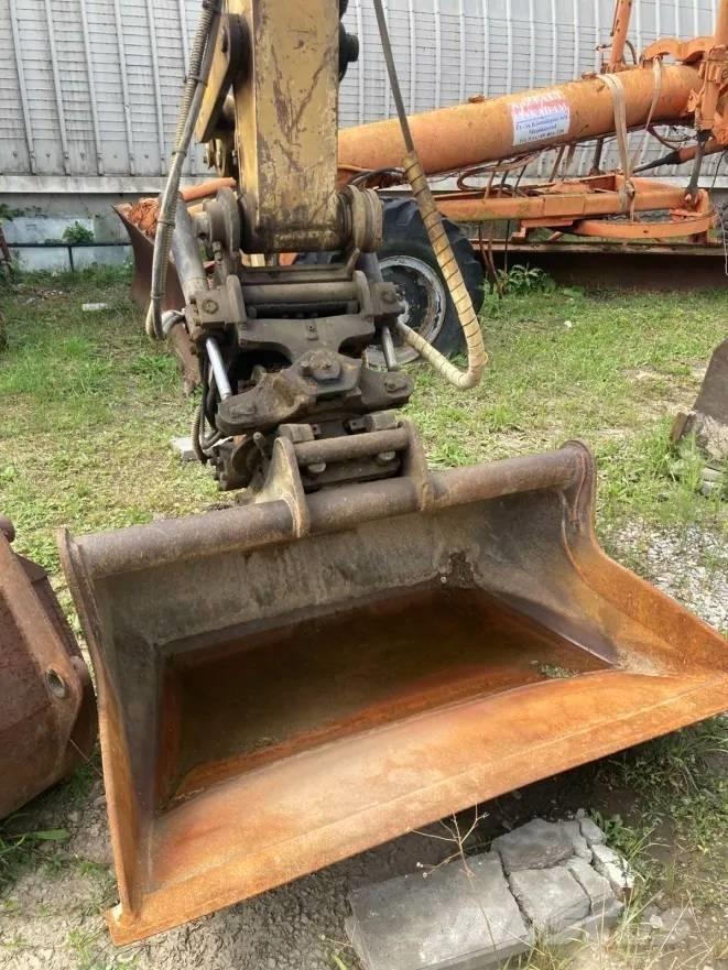 CAT M 312  휠 굴삭기