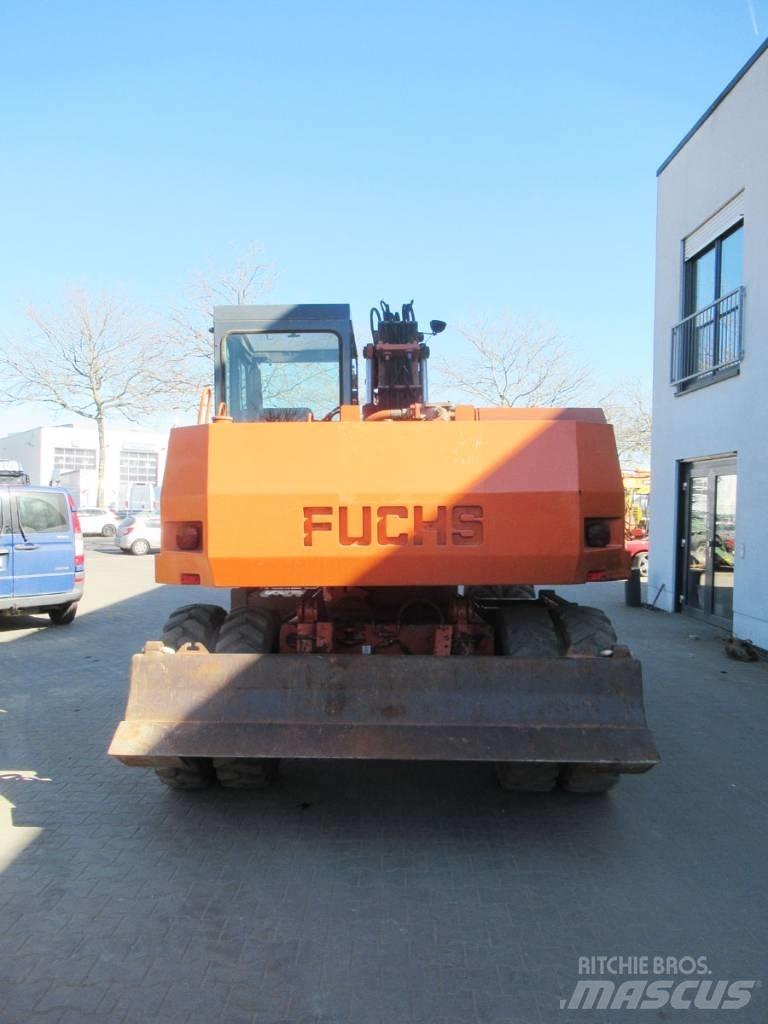 Fuchs 712M  휠 굴삭기