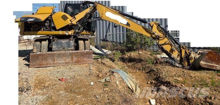 CAT M 313 D  휠 굴삭기