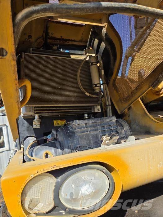 CAT M 313 D  휠 굴삭기